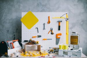 plastic toys on a pegboard